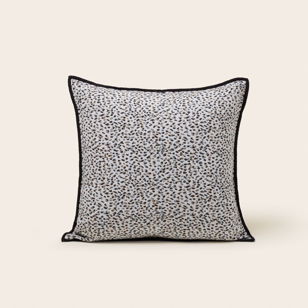 Housse de coussin Ocelo ivoire et noir design graphique