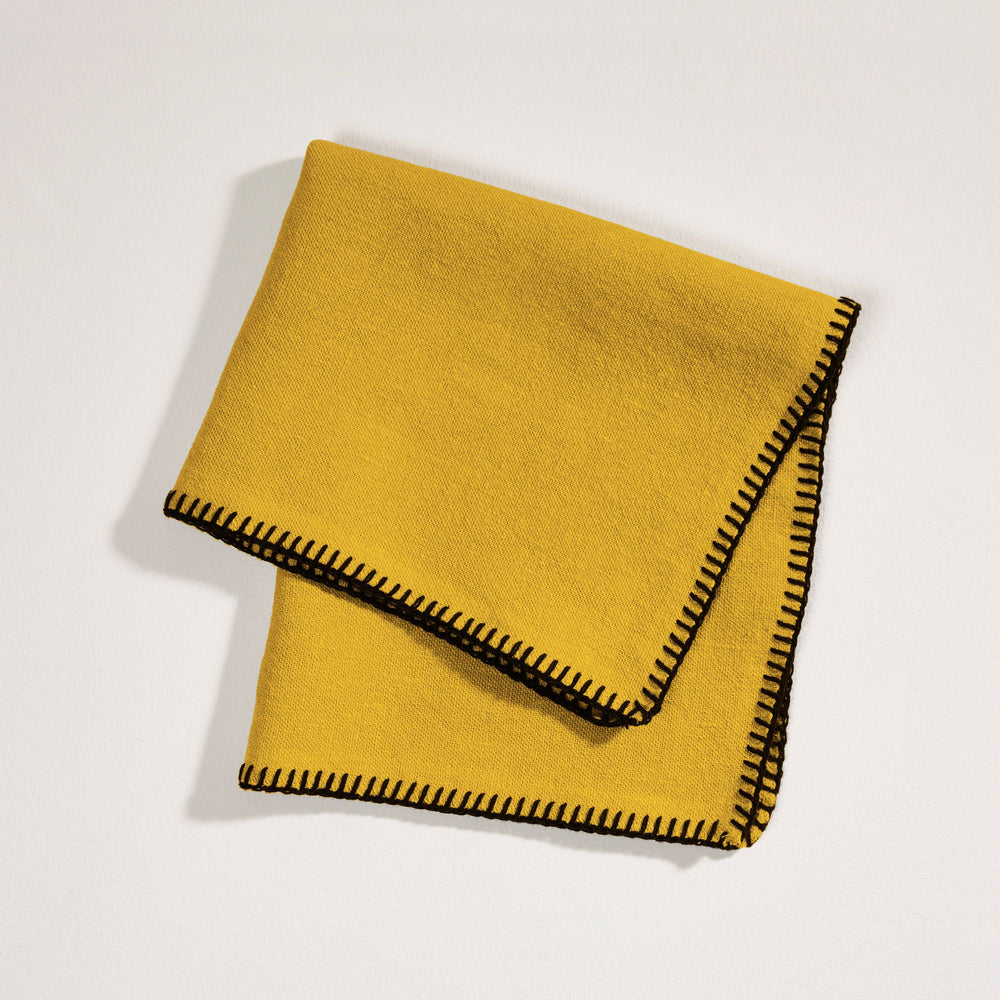 Serviette de table NINO 100% lin certifié Oeko-Tex - Ocre et feston noir